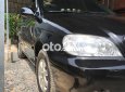 Kia Carnival 2006 - Bán ô tô Kia Carnival sản xuất năm 2006, màu đen