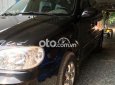 Kia Carnival 2006 - Bán ô tô Kia Carnival sản xuất năm 2006, màu đen