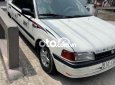 Mazda 323 1995 - Xe Mazda 323 năm 1995, màu trắng, nhập khẩu