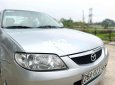 Mazda 323 2004 - Cần bán gấp Mazda 323 năm sản xuất 2004, màu bạc, xe nhập giá cạnh tranh