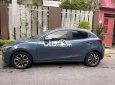 Mazda 2 2016 - Bán xe Mazda 2 1.5AT sản xuất năm 2016, màu xanh lam mới chạy 45.000 km