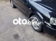 Ford Laser 2003 - Cần bán Ford Laser 1.8 năm 2003, màu đen, 129tr