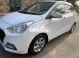 Hyundai Grand i10 2019 - Bán Hyundai Grand i10 Sedan 1.2AT sản xuất năm 2019, màu trắng số tự động, giá tốt