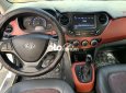 Hyundai Grand i10 2019 - Bán Hyundai Grand i10 Sedan 1.2AT sản xuất năm 2019, màu trắng số tự động, giá tốt