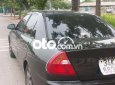 Mitsubishi Lancer 2002 - Bán Mitsubishi Lancer sản xuất năm 2002, màu đen, xe nhập, giá 85tr