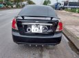 Daewoo Lacetti 2004 - Bán ô tô Daewoo Lacetti năm 2004, màu đen, xe nhập