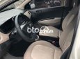 Hyundai Grand i10 2016 - Bán ô tô Hyundai Grand i10 MT năm 2016, màu trắng, xe nhập chính chủ