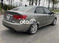 Kia Cerato 2010 - Bán Kia Cerato 1.6AT Deluxe sản xuất 2010, màu xám