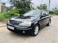 Ford Laser 2004 - Bán ô tô Ford Laser sản xuất 2004, màu đen, 157 triệu