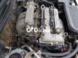 Ford Laser 2004 - Bán ô tô Ford Laser LXI năm 2004, màu bạc số sàn