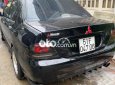 Mitsubishi Lancer 2003 - Bán ô tô Mitsubishi Lancer năm sản xuất 2003, màu đen số tự động, 185tr