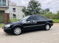 Ford Laser 2004 - Bán ô tô Ford Laser sản xuất 2004, màu đen, 157 triệu