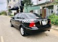 Ford Laser 2004 - Bán ô tô Ford Laser sản xuất 2004, màu đen, 157 triệu