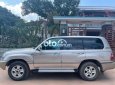 Toyota Land Cruiser 2004 - Cần bán lại xe Toyota Land Cruiser sản xuất năm 2004, màu ghi vàng