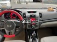 Kia Cerato 2011 - Cần bán Kia Cerato 1.6AT sản xuất năm 2011, màu trắng