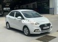 Hyundai Grand i10 2020 - Bán Hyundai Grand i10 1.2AT sản xuất 2020, màu trắng số tự động, 388tr