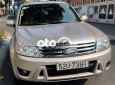 Ford Escape 2009 - Cần bán lại xe Ford Escape XLT 4x4 2009, màu vàng