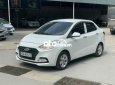 Hyundai Grand i10 2020 - Bán Hyundai Grand i10 1.2AT sản xuất 2020, màu trắng số tự động, 388tr