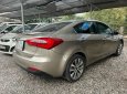 Kia K3 2015 - Bán Kia K3 năm 2015, màu vàng cát, giá tốt