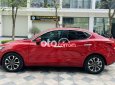 Mazda 2 2016 - Cần bán lại xe Mazda 2 AT sản xuất năm 2016, màu đỏ