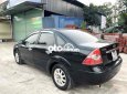 Ford Focus 2006 - Bán Ford Focus sản xuất 2006, màu đen xe gia đình, 180tr