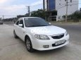 Mazda 323 2004 - Cần bán lại xe Mazda 323 sản xuất năm 2004, màu trắng