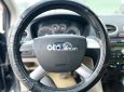 Ford Focus 2006 - Bán Ford Focus sản xuất 2006, màu đen xe gia đình, 180tr