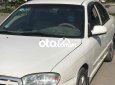 Kia Spectra 2004 - Bán xe Kia Spectra sản xuất 2004, màu trắng, nhập khẩu, giá 100tr