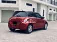 Suzuki Swift 2016 - Bán ô tô Suzuki Swift 1.4AT sản xuất 2016, màu đỏ