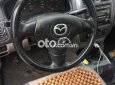 Mazda 323 2003 - Màu trắng chính chủ