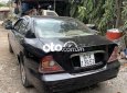 Daewoo Magnus 2004 - Cần bán Daewoo Magnus năm sản xuất 2004, màu đen, giá tốt