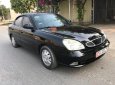 Daewoo Nubira 2003 - Màu đen, giá 52tr