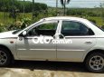 Mazda 323 2000 - Màu trắng