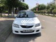 Mazda 323 2002 - Màu trắng