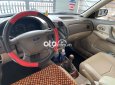 Ford Laser 2004 - Màu đen, 155 triệu