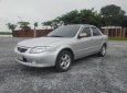 Mazda 323 2001 - Màu bạc xe gia đình, giá chỉ 110 triệu