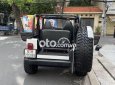 Jeep Wrangler 1990 - Màu trắng, giá cực tốt