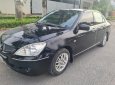 Mitsubishi Lancer 2002 - Màu đen xe gia đình, giá ưu đãi