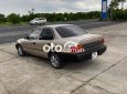 Toyota Corona 1996 - Màu ghi bạc