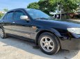 Mazda 323 2003 - Màu đen chính chủ, 120 triệu