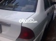 Ford Laser 2002 - Cần bán xe màu trắng