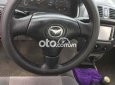 Mazda 323 2003 - Màu đen giá cạnh tranh