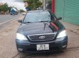 Ford Mondeo 2004 - Màu đen số tự động, 165tr