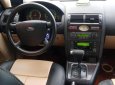 Ford Mondeo 2004 - Màu đen số tự động, 165tr