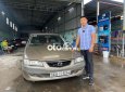 Mazda 626 2003 - Màu vàng, 135 triệu