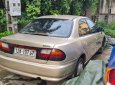 Mazda 323 2000 - Màu vàng, giá cạnh tranh