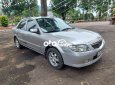 Mazda 323 2003 - Màu bạc, 122tr