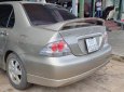 Mitsubishi Lancer 2005 - Xe màu vàng cát