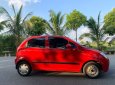 Chevrolet Spark 2011 - Che mưa che nắng