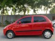 Chevrolet Spark 2011 - Che mưa che nắng